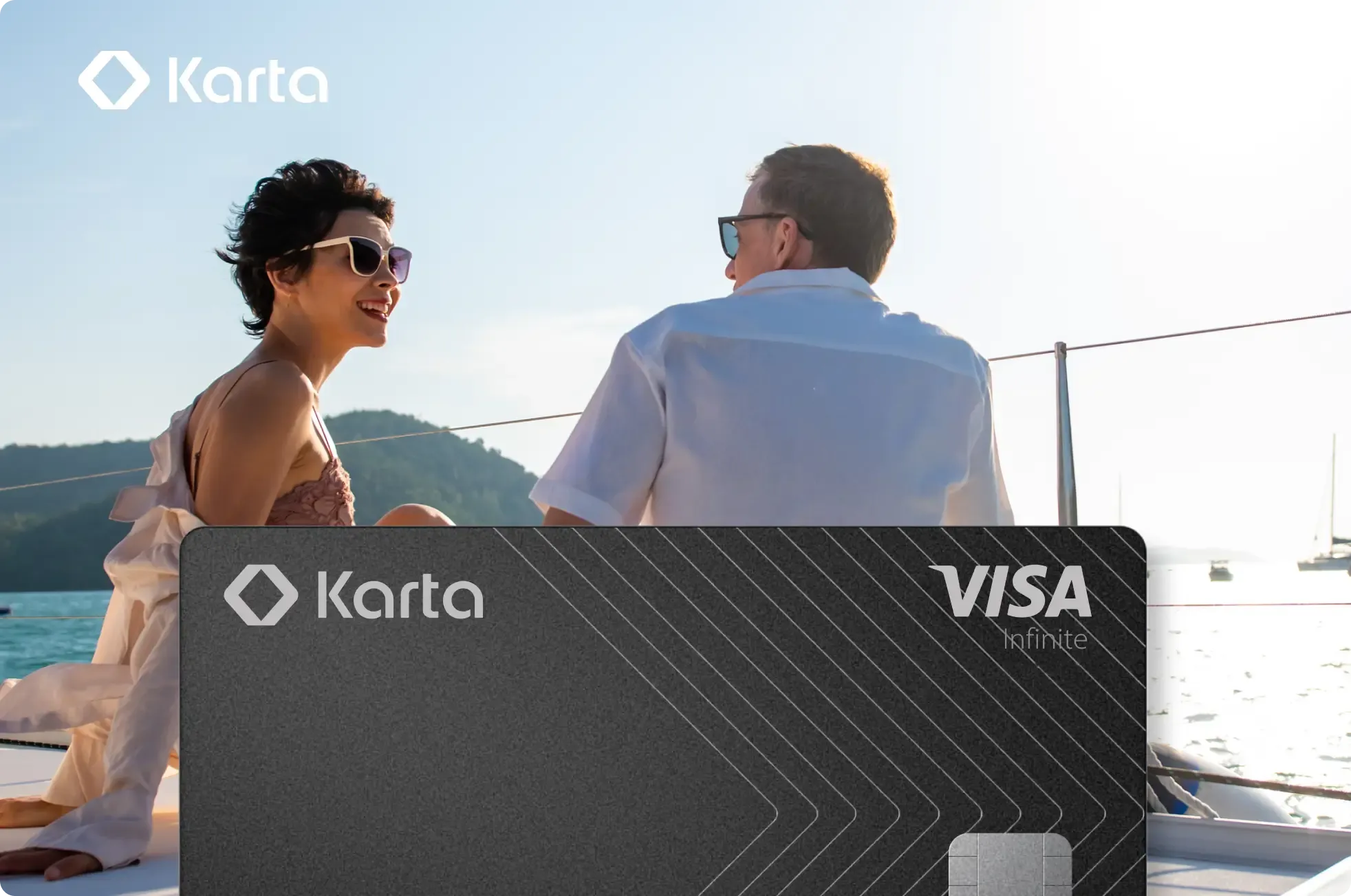 Karta metal credit card — top-down view of the matte black front face with Visa Infinite mark